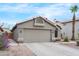 Charming single-story home featuring a two-car garage and desert landscaping at 8948 W Fargo Dr, Peoria, AZ 85382