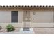 Inviting front entrance with security screen door and stylish light fixture at 8948 W Fargo Dr, Peoria, AZ 85382