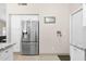A bright kitchen featuring modern stainless steel refrigerator at 8948 W Fargo Dr, Peoria, AZ 85382