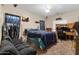 Bedroom featuring a closet rack, lounge area, and a desk at 13313 W Indianola Ave, Litchfield Park, AZ 85340