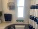 Bright bathroom featuring a striped shower curtain, modern fixtures, and stylish decor at 1426 S Havasupai Dr, Apache Junction, AZ 85119