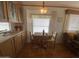 Dining nook with a table and chairs, conveniently located near the kitchen at 1426 S Havasupai Dr, Apache Junction, AZ 85119