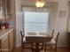 Charming dining area with natural light, perfect for casual meals and entertaining at 1426 S Havasupai Dr, Apache Junction, AZ 85119