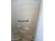 Shower with white tile and grab bar for safety and accessibility at 1426 S Havasupai Dr, Apache Junction, AZ 85119