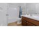 Clean, well-lit bathroom with a shower, toilet, and vanity at 1453 W Birch Rd, San Tan Valley, AZ 85140