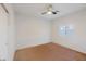 Empty bedroom with neutral carpet, white walls, and a ceiling fan at 1453 W Birch Rd, San Tan Valley, AZ 85140