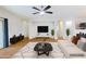 Staged living room featuring wood flooring, neutral walls, modern furniture, and stylish decor at 1453 W Birch Rd, San Tan Valley, AZ 85140