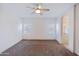 Bright and spacious main bedroom with neutral walls, carpet, and a ceiling fan at 1453 W Birch Rd, San Tan Valley, AZ 85140