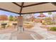 Community playground under shaded picnic structure with BBQ grills and picnic tables at 1453 W Birch Rd, San Tan Valley, AZ 85140