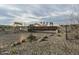 View of a community park featuring a bridge, picnic areas and desert landscaping at 15787 W Mariposa Grande St, Surprise, AZ 85387