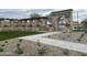 The Escalante by Fulton Homes entrance is surrounded by beautifully landscaped grounds at 15787 W Mariposa Grande St, Surprise, AZ 85387