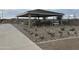 Outdoor picnic area featuring covered tables, benches, and landscaped grounds at 15787 W Mariposa Grande St, Surprise, AZ 85387