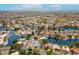 Expansive aerial view of the community featuring a network of lakes, homes, and recreational areas at 1601 E Cindy St, Chandler, AZ 85225