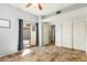 Bedroom featuring a sliding glass door and ample closet space at 1601 E Cindy St, Chandler, AZ 85225