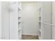 Walk-in closet with custom shelving for optimal organization at 1601 E Cindy St, Chandler, AZ 85225