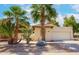 Charming home exterior with mature palm trees and desert landscaping at 1601 E Cindy St, Chandler, AZ 85225