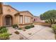 Charming home with manicured landscaping, providing excellent curb appeal at 17009 W Eureka Springs Dr, Surprise, AZ 85387