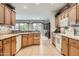 Cozy kitchen with granite countertops, tile backsplash and lots of natural light at 17009 W Eureka Springs Dr, Surprise, AZ 85387