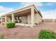 The covered backyard patio is perfect for outdoor living, set in a landscaped garden at 18247 N 168Th Cir, Surprise, AZ 85374