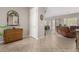 Open-concept foyer showcasing neutral paint, tile flooring and views into the living room at 18247 N 168Th Cir, Surprise, AZ 85374