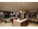 Bright, open-concept living space featuring modern kitchen island, dining area, and stylish built-ins at 19360 N 73Rd St # 1066, Scottsdale, AZ 85255