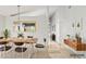 Bright dining room with a modern table, stylish chairs, and a minimalist aesthetic at 1962 E Morrow Dr, Phoenix, AZ 85024