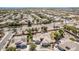 Panoramic aerial of the neighborhood highlighting the home's pool, yard, and suburban setting at 19903 S 187Th Dr, Queen Creek, AZ 85142
