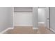 Walk-in closet has ample storage space and natural wood floors throughout at 19903 S 187Th Dr, Queen Creek, AZ 85142