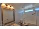Bathroom featuring a toilet, tub, shower combo, and a granite-style vanity at 23929 W Twilight Trl, Buckeye, AZ 85326
