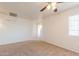 Bedroom featuring neutral walls and carpet at 23929 W Twilight Trl, Buckeye, AZ 85326