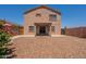 A charming home with covered patio and a low-maintenance yard for outdoor enjoyment at 23929 W Twilight Trl, Buckeye, AZ 85326