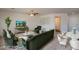 Cozy staged living room featuring elegant furniture, modern decor, and bright, airy space at 23929 W Twilight Trl, Buckeye, AZ 85326
