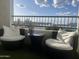 Comfortable outdoor seating arrangement with two armchairs and a small table, perfect for enjoying the weather at 2511 W Queen Creek Rd # 378, Chandler, AZ 85248