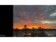Beautiful sunset view with palm trees and a red-orange sky at 2511 W Queen Creek Rd # 378, Chandler, AZ 85248