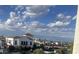 Scenic view of a charming neighborhood with beautiful architecture, palm trees, and manicured landscaping at 2511 W Queen Creek Rd # 378, Chandler, AZ 85248
