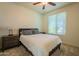 Comfortable bedroom featuring carpet, a plush bed, and a window at 2543 W Rabjohn Rd, Phoenix, AZ 85085