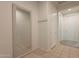 Inviting entryway with tile flooring, a full-length mirror, and coat hooks at 2543 W Rabjohn Rd, Phoenix, AZ 85085
