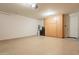 Spacious garage features epoxy floors, storage cabinets, and water filtration system at 2543 W Rabjohn Rd, Phoenix, AZ 85085
