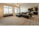 Large living room showcasing an open floor plan with ample natural light at 2543 W Rabjohn Rd, Phoenix, AZ 85085