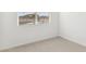 Cozy bedroom with a large window at 25479 W Graham Trl, Buckeye, AZ 85326