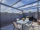 Cozy backyard patio area with a modern shade structure, perfect for outdoor dining and relaxing at 2550 E Caballero St, Mesa, AZ 85213