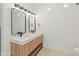 Modern bathroom with double sink vanity, quartz countertop, and designer fixtures at 3221 N 37Th St # 26, Phoenix, AZ 85018