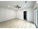 Bright bedroom with ceiling fan, white walls, and lots of open space at 3221 N 37Th St # 26, Phoenix, AZ 85018