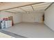 Spacious two-car garage with epoxy flooring and laundry hookups, offering ample storage and functionality at 3221 N 37Th St # 26, Phoenix, AZ 85018