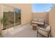 Private outdoor patio with comfortable seating and serene views at 3221 N 37Th St # 26, Phoenix, AZ 85018