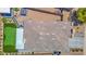 Beautiful backyard with a built-in bar and grill, artificial grass, and a hot tub at 3498 E Ravenswood Dr, Gilbert, AZ 85298