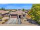 Beautiful single-Gathering home with a well-manicured yard and a two car garage at 3498 E Ravenswood Dr, Gilbert, AZ 85298