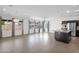 Spacious living room with large windows, tile flooring, and recessed lighting at 3498 E Ravenswood Dr, Gilbert, AZ 85298