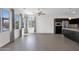 Open living space featuring large windows, tile floors, and recessed lighting at 3498 E Ravenswood Dr, Gilbert, AZ 85298