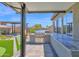 Covered outdoor kitchen complete with grill and bar area, perfect for entertaining at 3498 E Ravenswood Dr, Gilbert, AZ 85298